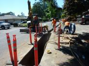 Contractors replacing old concrete sewer line trenchlessly on Maplewood Drive 