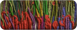 Picture of multi-colored fibers with knots in them for visual design