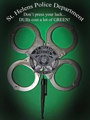 Four leaf clover made of police handcuffs and police badge against green background