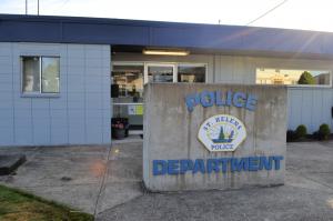 Front of police station with police department sign. 